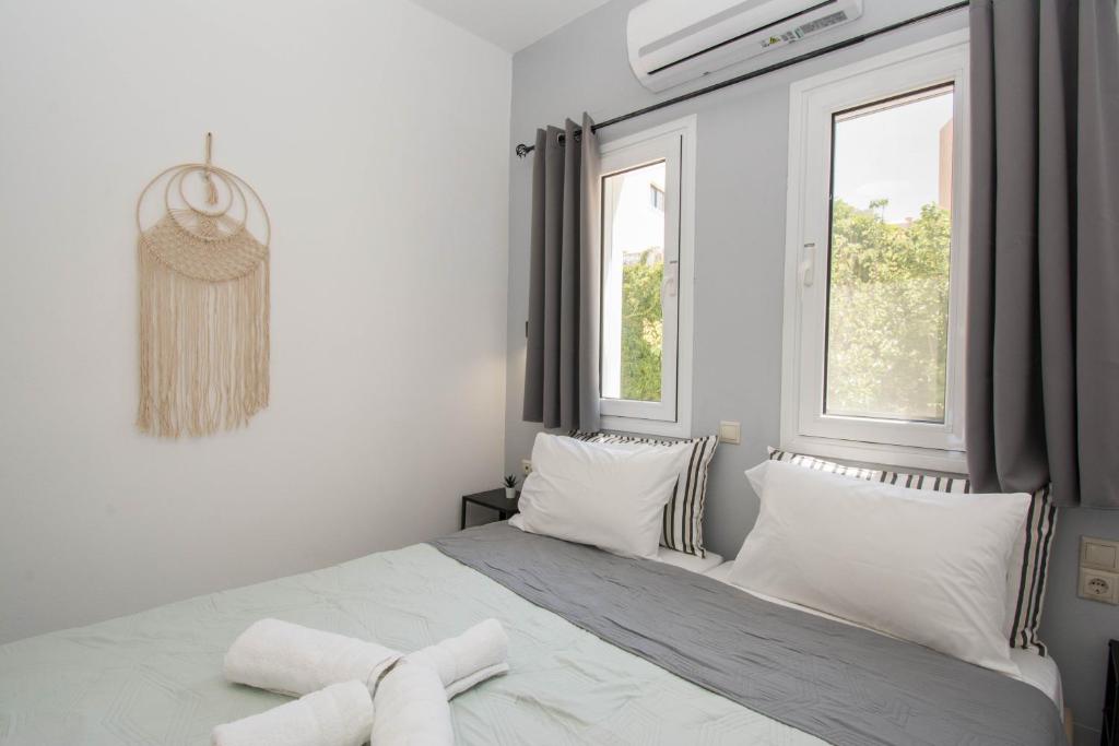 Postel nebo postele na pokoji v ubytování Jasmine Suites "By Checkin"