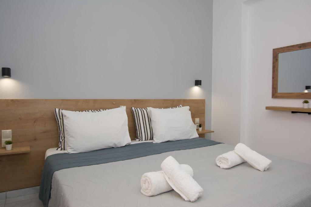 Postel nebo postele na pokoji v ubytování Jasmine Suites "By Checkin"