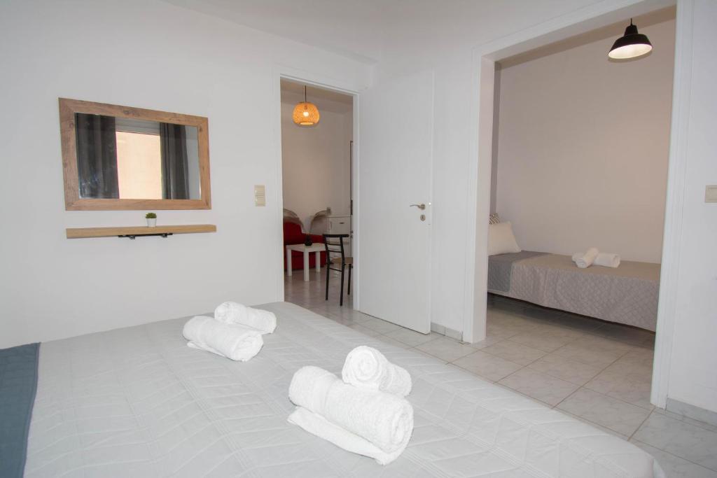 Postel nebo postele na pokoji v ubytování Jasmine Suites "By Checkin"