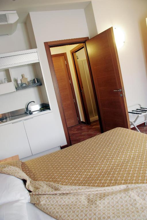 Postel nebo postele na pokoji v ubytování Bed&Wine