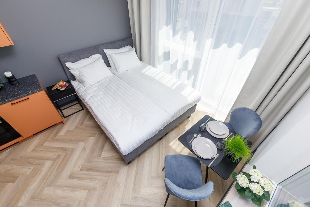 Postel nebo postele na pokoji v ubytování Rare Apartments - Self Check-In Miniapartments