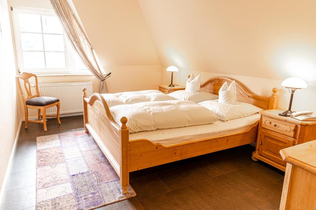 Postel nebo postele na pokoji v ubytování Hotel Haferland