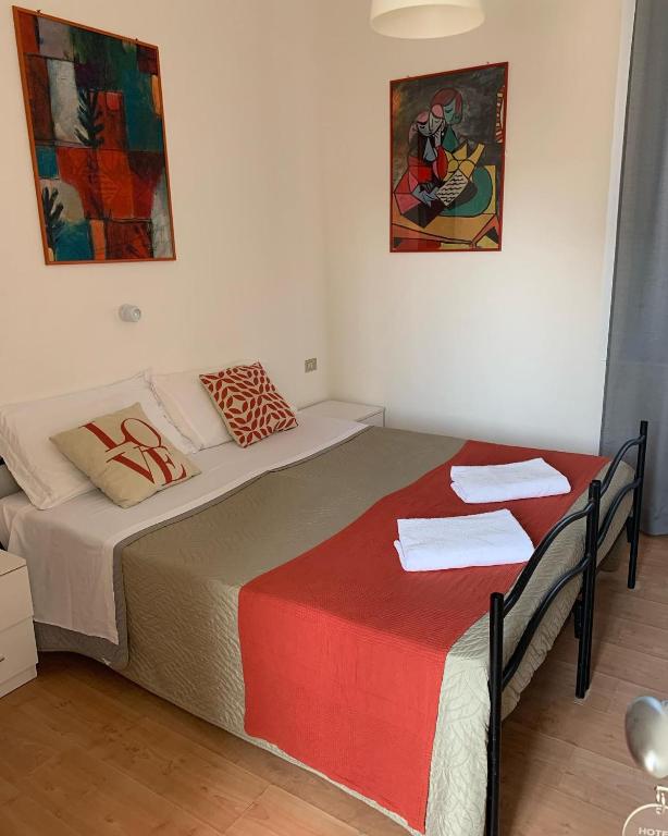 Postel nebo postele na pokoji v ubytování Hotel Migani