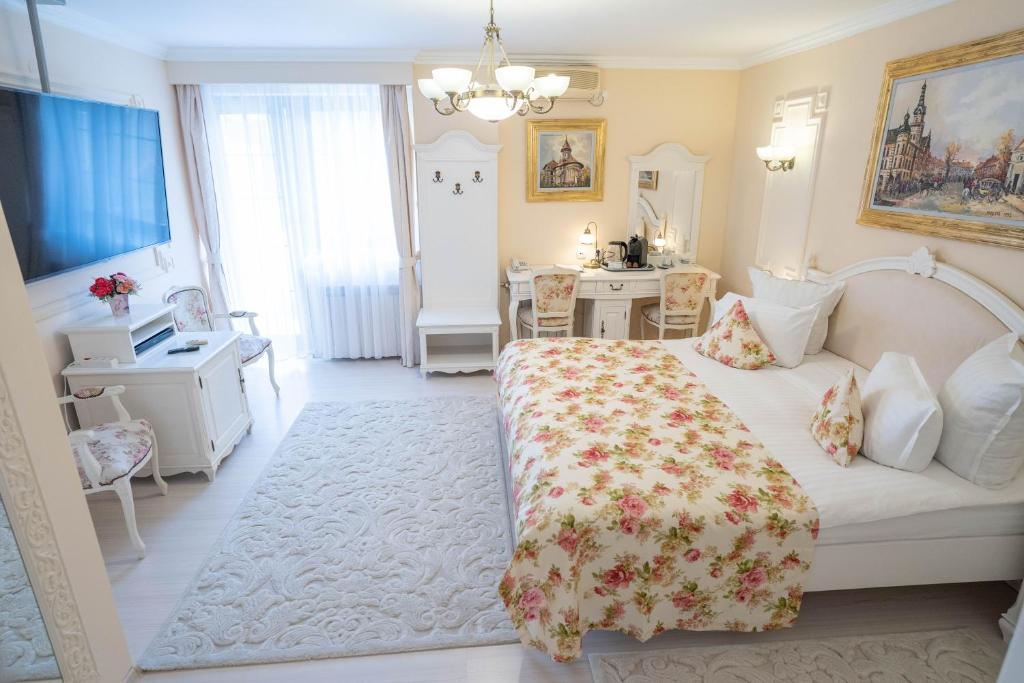 Postel nebo postele na pokoji v ubytování Villa Alice