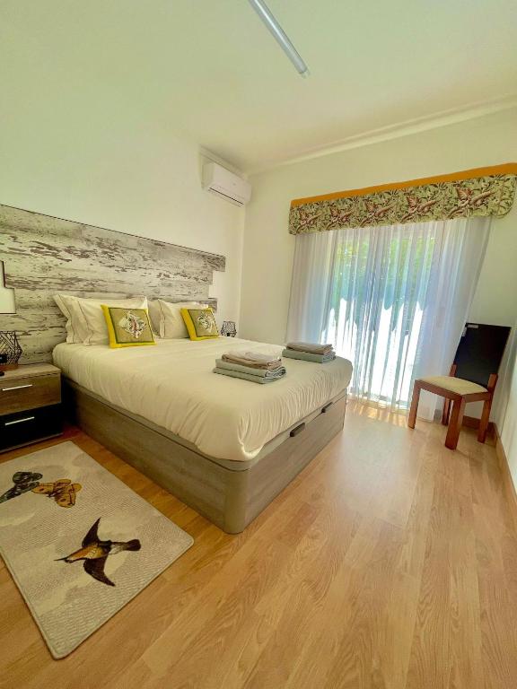 Postel nebo postele na pokoji v ubytování APART Casas Brancas