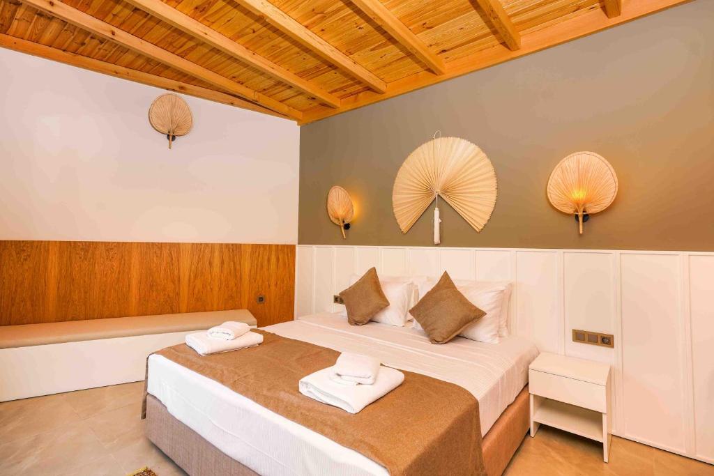 Postel nebo postele na pokoji v ubytování Likya Gardens Hotel