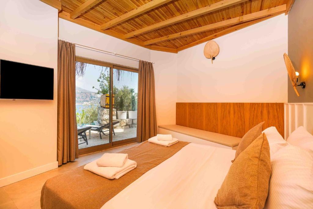 Postel nebo postele na pokoji v ubytování Likya Gardens Hotel