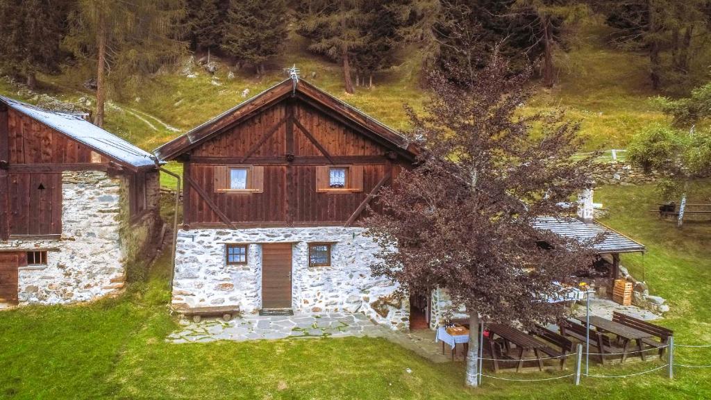 an aerial view of a house in the mountains at Baita Vioz in Peio