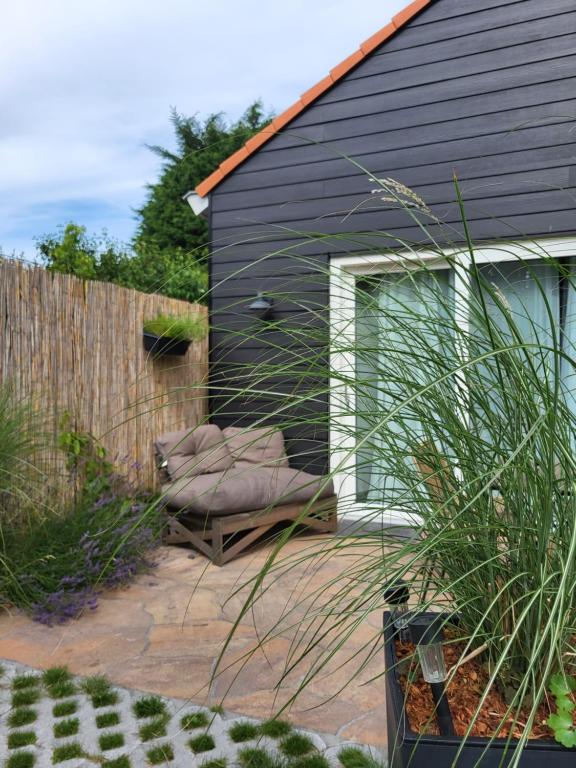 Zahrada ubytování Het Huisje comfortabel, luxe & sfeervol nabij het strand