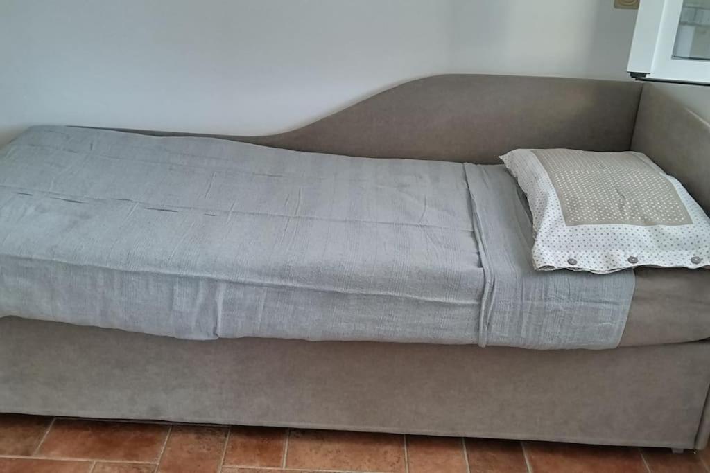 Postel nebo postele na pokoji v ubytování Da Lilli - un angolo di paradiso nel verde