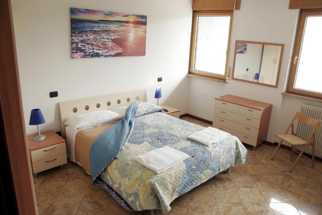 Postel nebo postele na pokoji v ubytování Bed&Wine