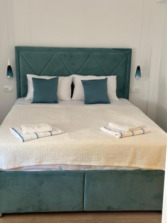 Postel nebo postele na pokoji v ubytování Apartments Ejla&Una