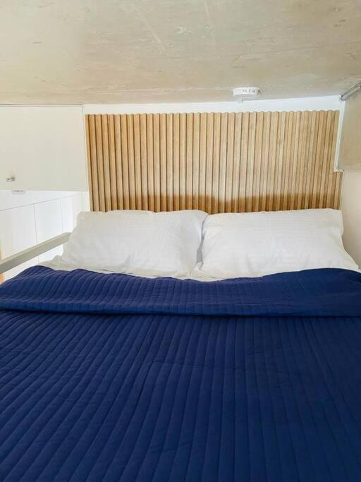 Postel nebo postele na pokoji v ubytování Loft en Chapinero con todo lo que necesitas !