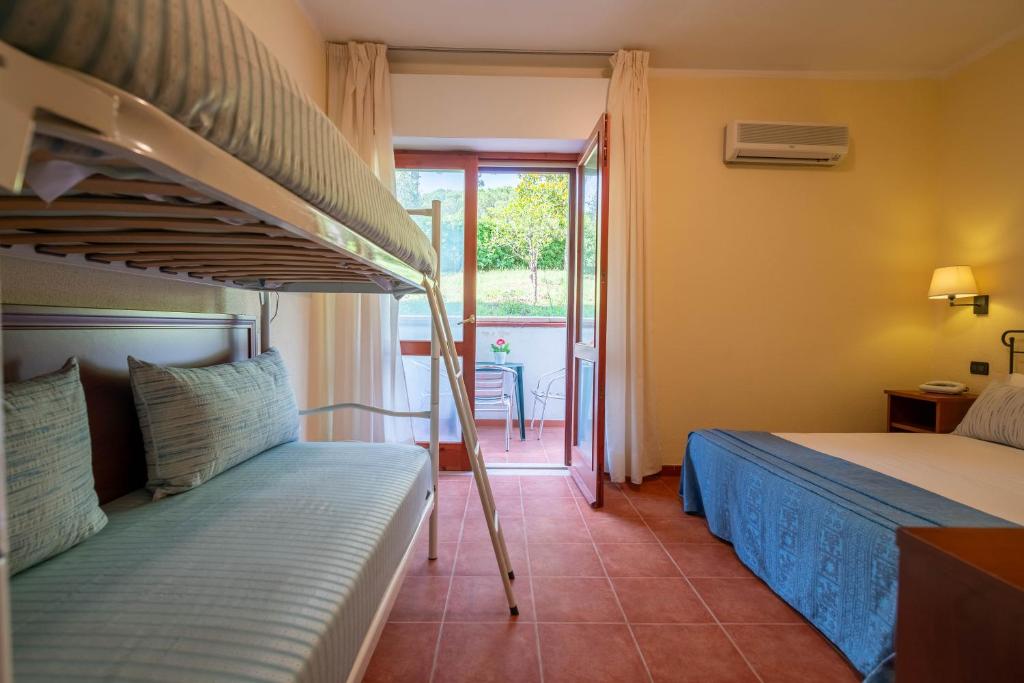 Krevet ili kreveti u jedinici u okviru objekta Hotel Mira