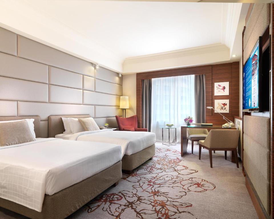 TV a/nebo společenská místnost v ubytování One World Hotel