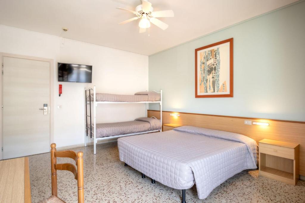 Postel nebo postele na pokoji v ubytování Hotel Itta