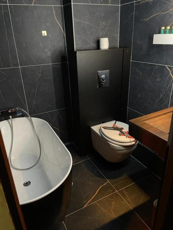 Koupelna v ubytování Hôtel les 4 éléments