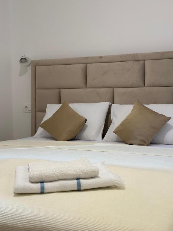 Postel nebo postele na pokoji v ubytování Apartments Ejla&Una