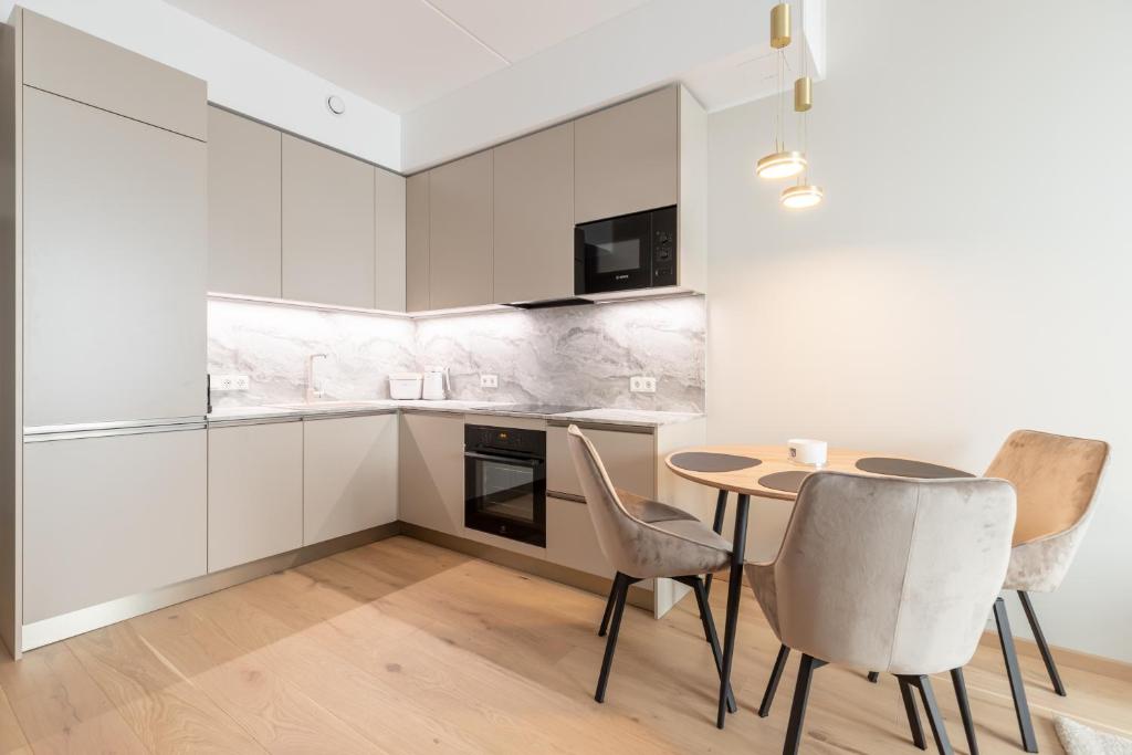 Kuchyň nebo kuchyňský kout v ubytování Laulupargi Lux Residence