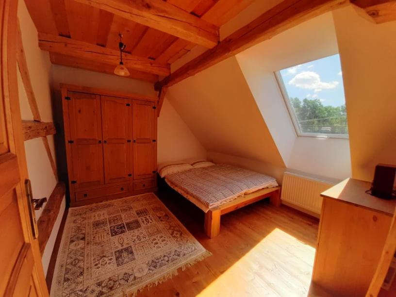 Postel nebo postele na pokoji v ubytování Chalupa Na3 Černá Voda