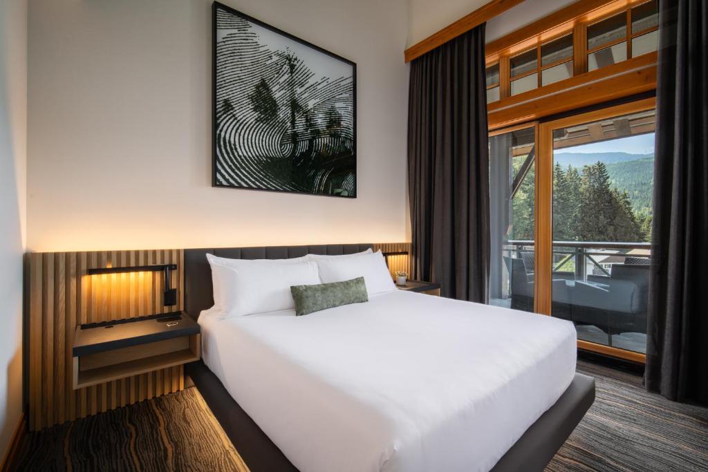 Voodi või voodid majutusasutuse Nita Lake Lodge toas