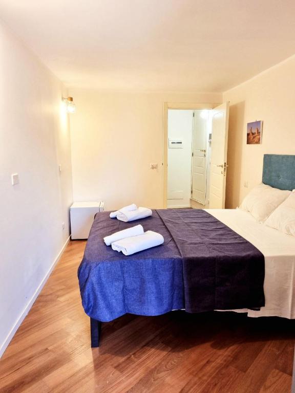 Postel nebo postele na pokoji v ubytování Atenea centro