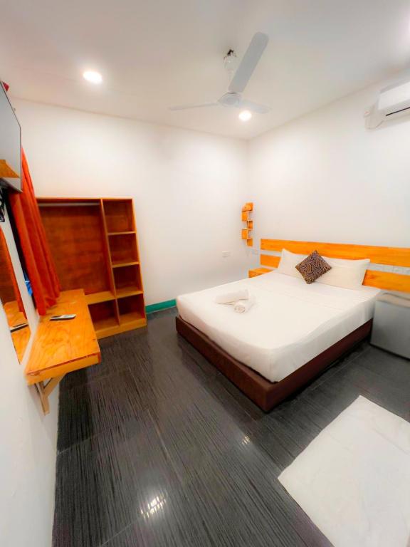 Postel nebo postele na pokoji v ubytování Elysian Hideaway