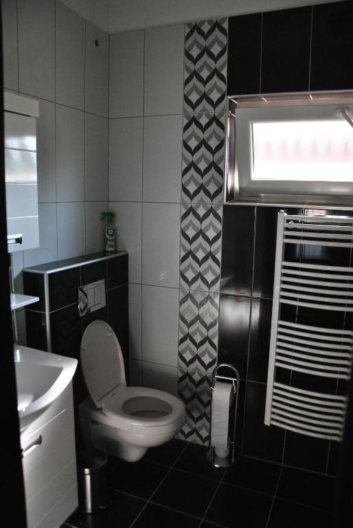 Koupelna v ubytování Panyi Apartman