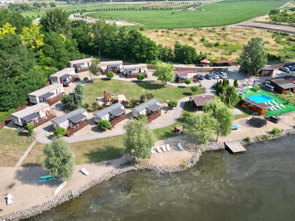 an aerial view of a resort on the water at Panorama Garden Pasohlavky in Pasohlávky