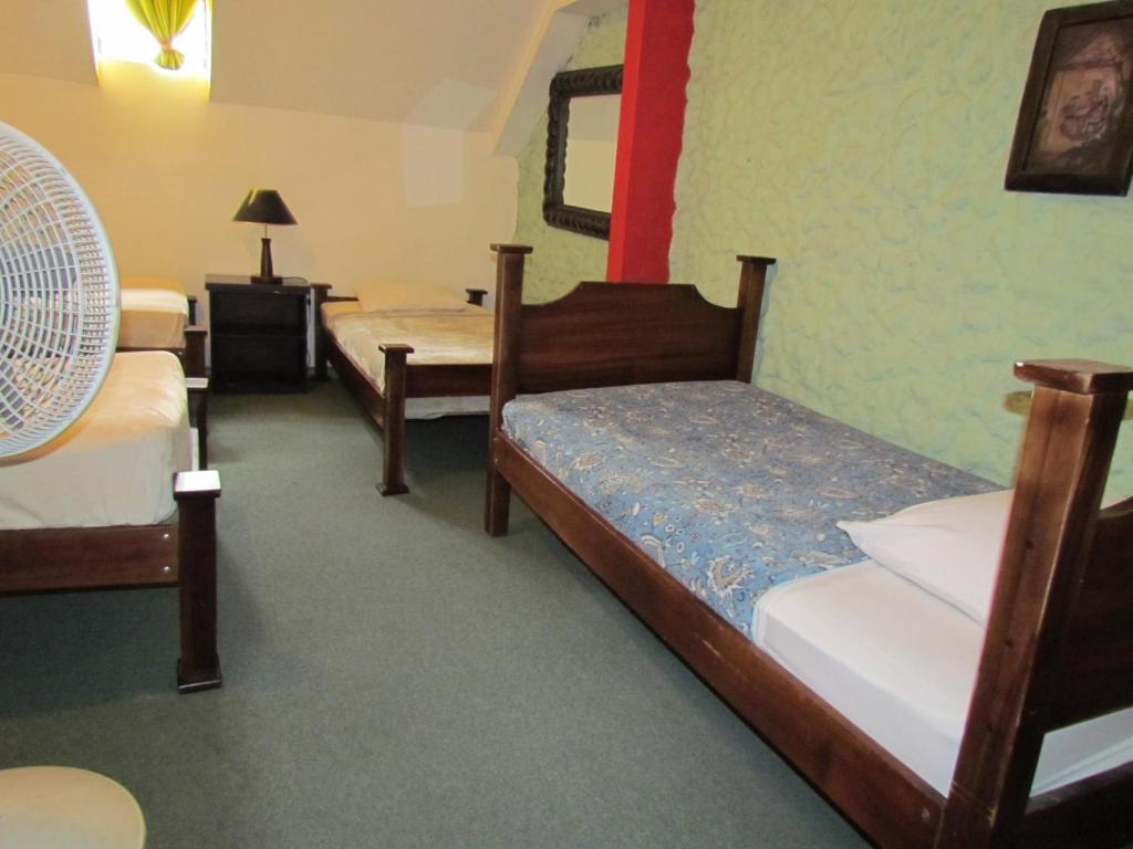 Postel nebo postele na pokoji v ubytování Hostel Shakti