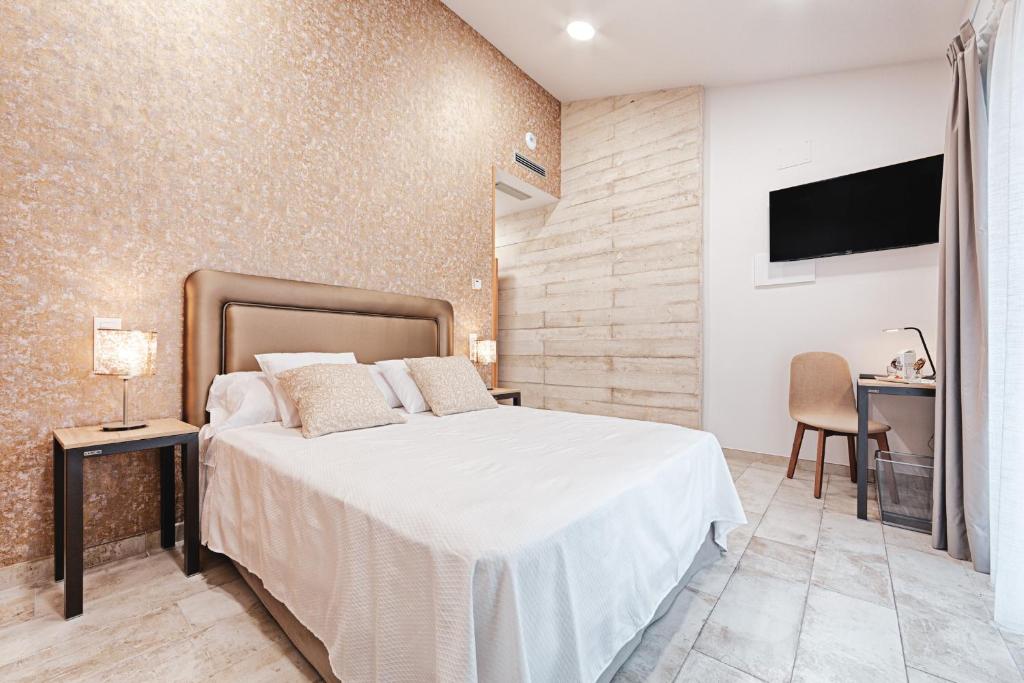 Posteľ alebo postele v izbe v ubytovaní Hotel rural La Tejera