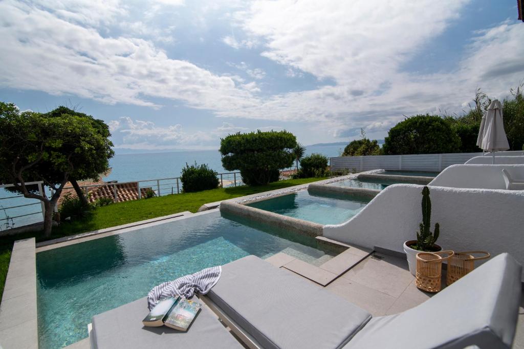 Beachfront · Private Beach White Suites Resort- Adults Only Hotel - Housity