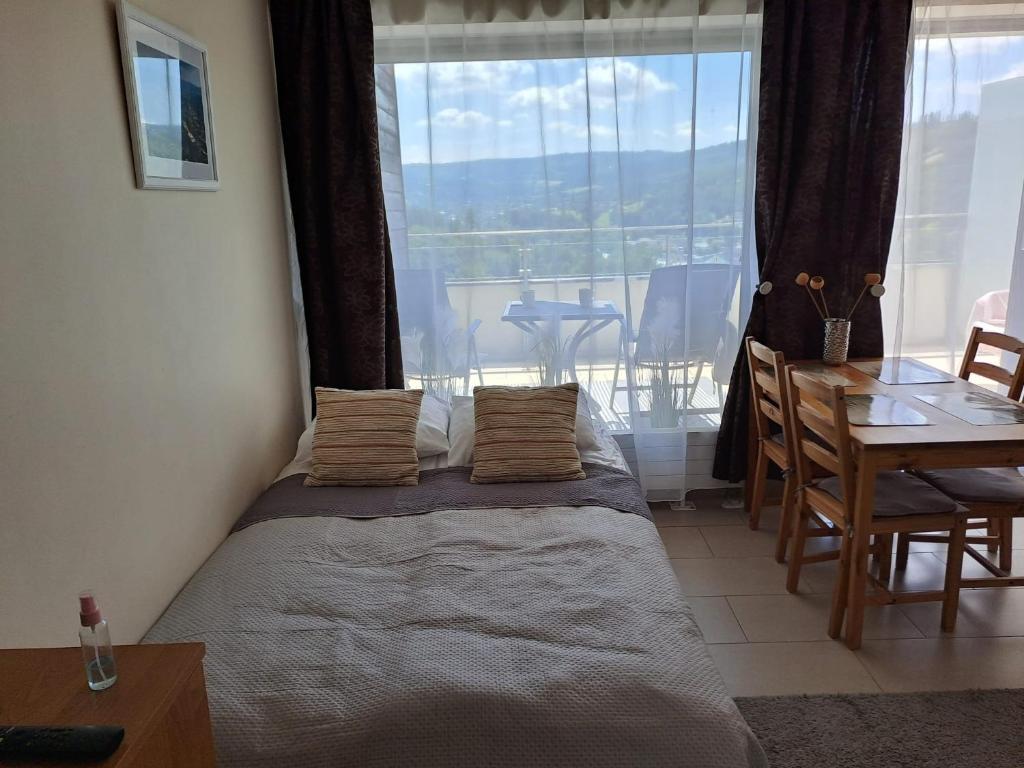 Katil atau katil-katil dalam bilik di Apartament Wisła Bukowa