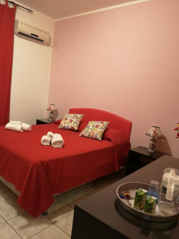 A bed or beds in a room at B&B Casa Valeria