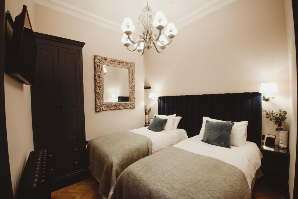 Postel nebo postele na pokoji v ubytování ch1 boutique stays