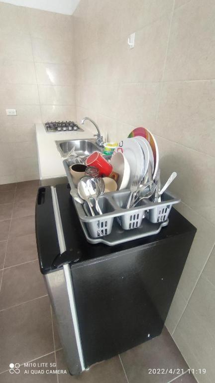 Kuchyň nebo kuchyňský kout v ubytování SANTYS HOUSE MELGAR apartamentos amoblados con capacidad para 6 personas para 6 personas