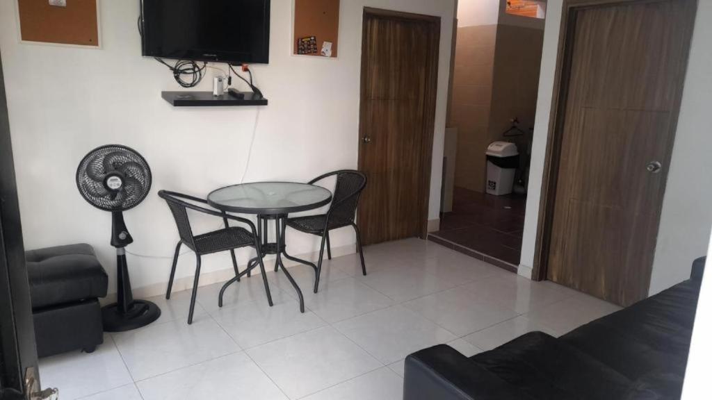 Posezení v ubytování SANTYS HOUSE MELGAR apartamentos amoblados con capacidad para 6 personas para 6 personas
