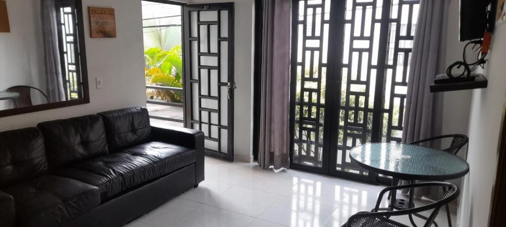 Posezení v ubytování SANTYS HOUSE MELGAR apartamentos amoblados con capacidad para 6 personas para 6 personas