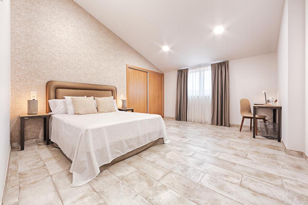 Posteľ alebo postele v izbe v ubytovaní Hotel rural La Tejera