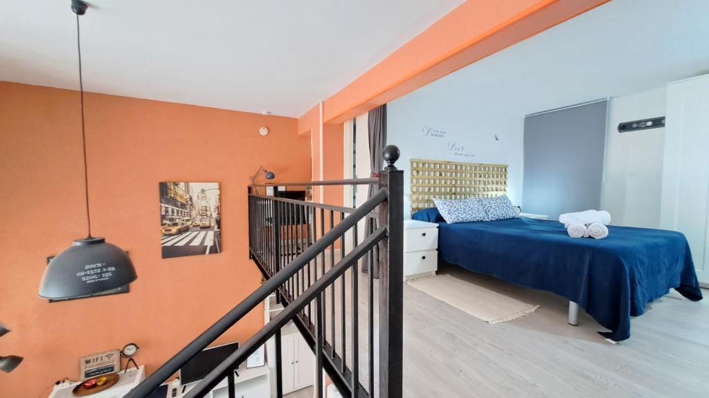 Postel nebo postele na pokoji v ubytování La Vaguada loft