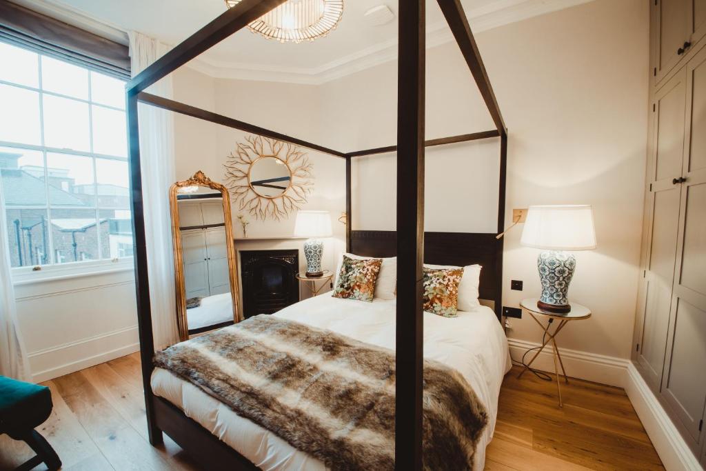 Postel nebo postele na pokoji v ubytování ch1 boutique stays