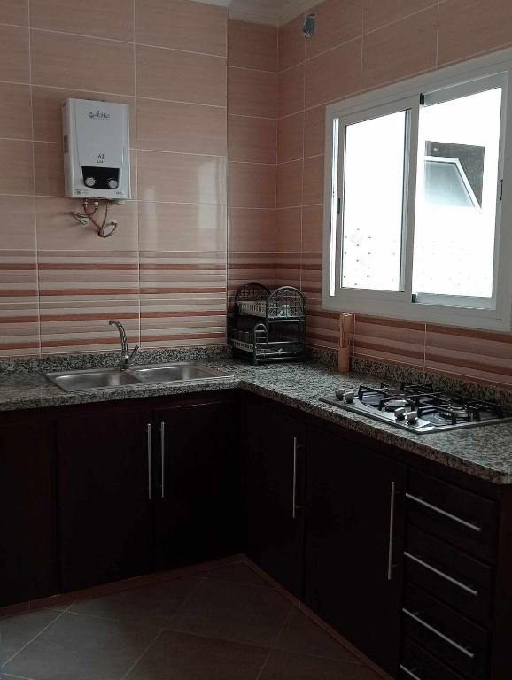 Kuchyň nebo kuchyňský kout v ubytování Appartments Achahbar