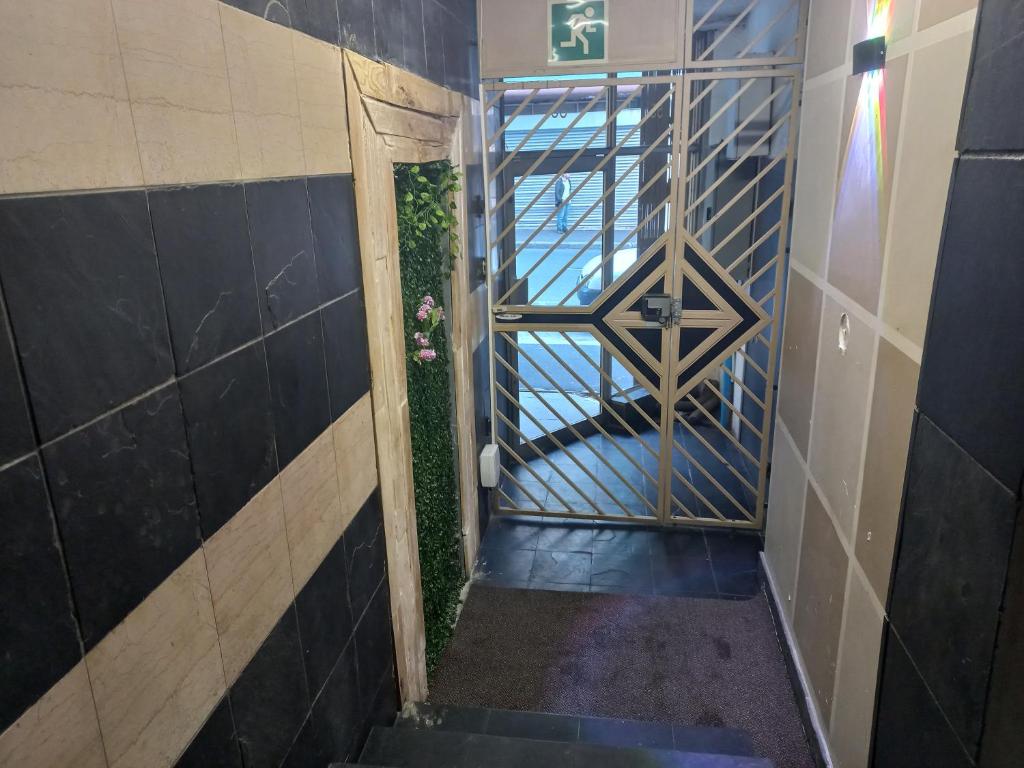 a stairway leading up to a door in a building at Home Away From Home in Cape Town