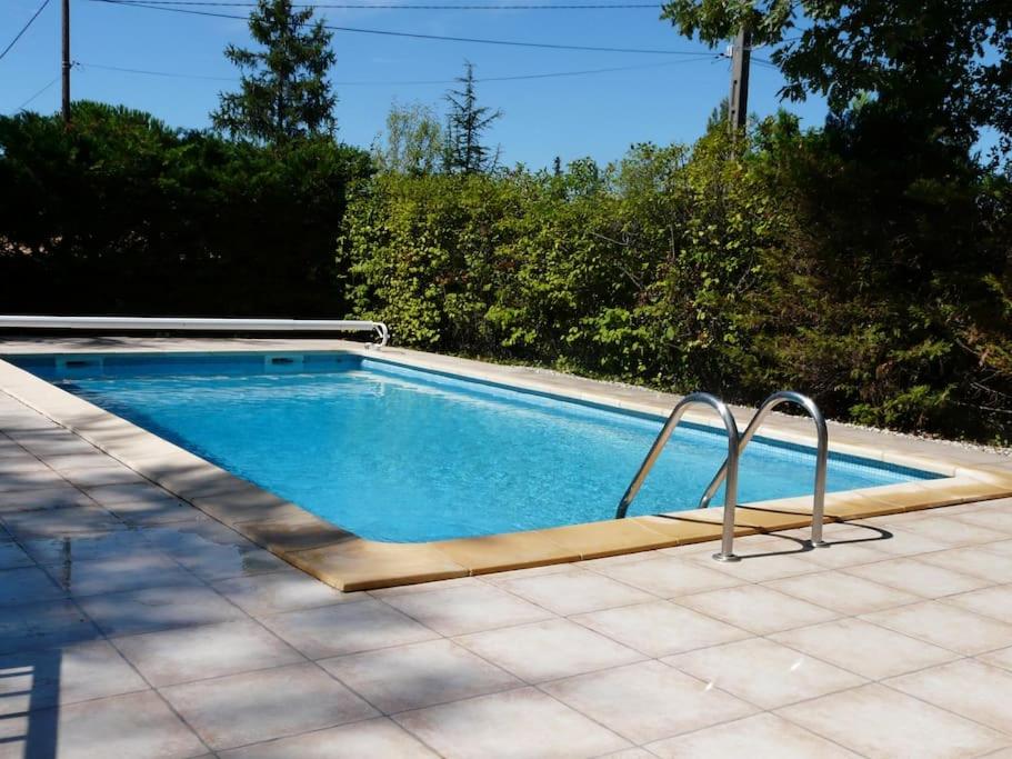 a small swimming pool in a yard with at agréable mas au calme jusqu'à 11 pers. près d'Uzès in Saint-Laurent-la-Vernède