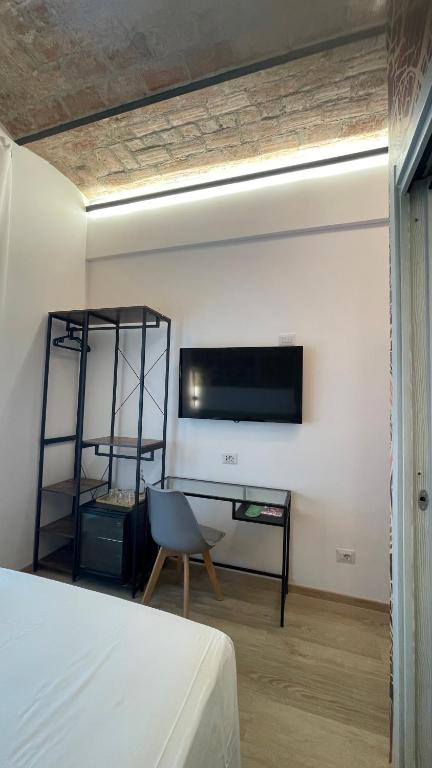 TV a/nebo společenská místnost v ubytování Hotel Felice