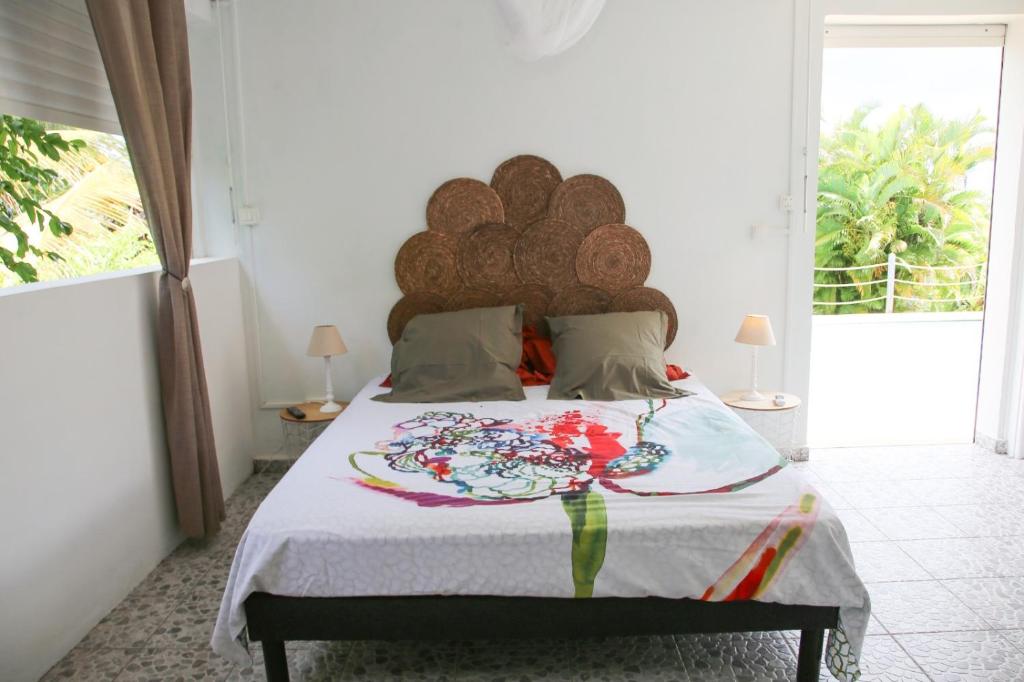 Posezení v ubytování L Orchidée Bleue, bas de villa, vue mer, piscine privée