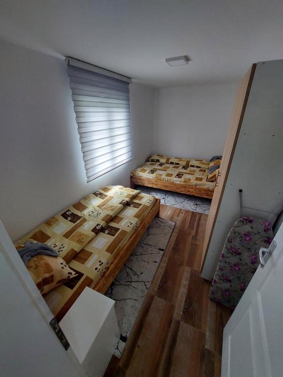 Katil atau katil-katil dalam bilik di Etno House Jakic