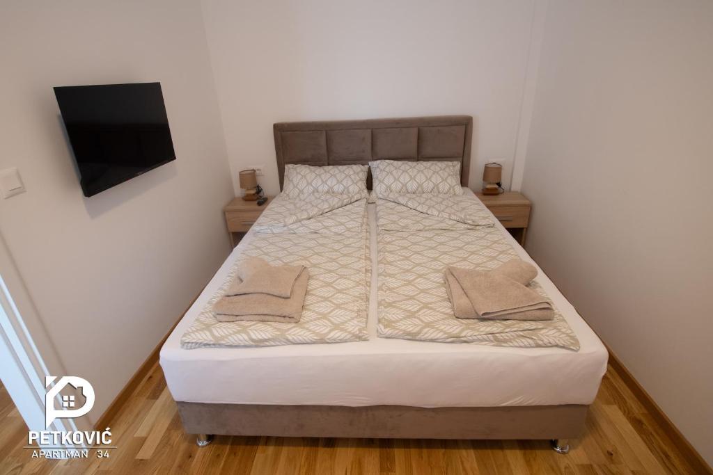 Postel nebo postele na pokoji v ubytování Petković apartmani 34