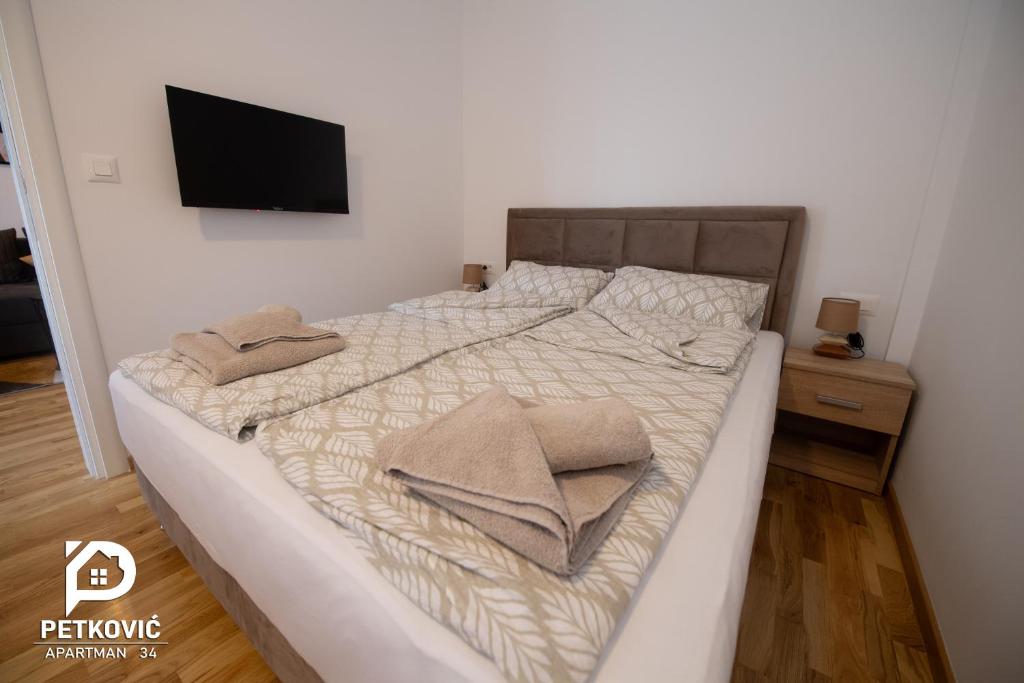 Postel nebo postele na pokoji v ubytování Petković apartmani 34