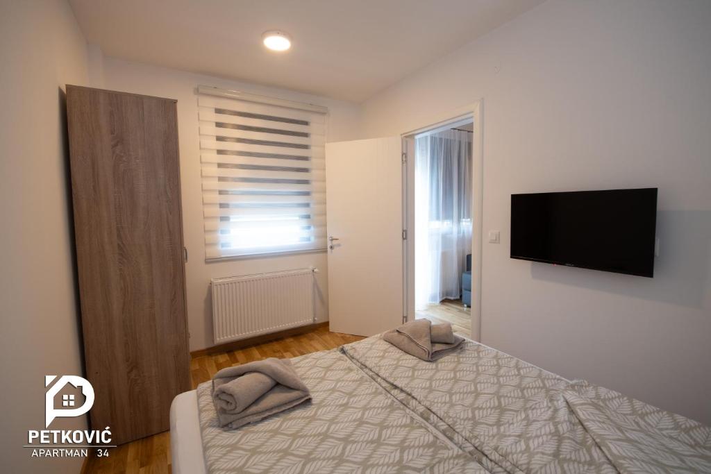 Postel nebo postele na pokoji v ubytování Petković apartmani 34